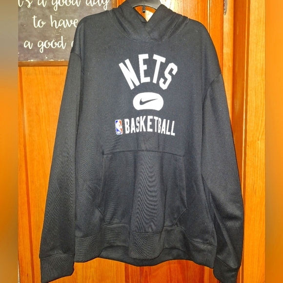 A Nike Dri-Fit New York Nets black hoodie in a men's size large. NWT. - Picture 1 of 6